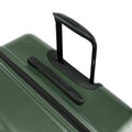 Dark green hard-shell suitcase top carry handle with textured grip