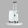 White textured hard-shell cabin suitcase with telescopic handle and four spinner wheels