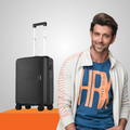 55cm cabin hard-shell suitcase in dark grey/black with extended handle and wheels