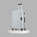 Light blue hardshell upright suitcase with telescopic handle and four spinner wheels
