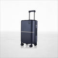 Hard-shell polycarbonate trolley luggage, dark blue, with side handle and four wheels