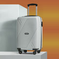 White cabin suitcase with textured panel, front view, four spinner wheels
