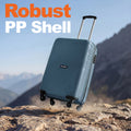 Hard-shell cabin suitcase in teal with 4 wheels, shown on rocky ground.