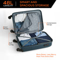 Opened cabin suitcase in teal showing interior lining, straps, and packing compartments.