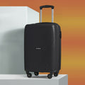 HRX cabin suitcase, black hard-shell front view with telescopic handle and 4 wheels.