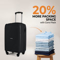 HRX cabin suitcase, black hard-shell on 4 wheels beside folded clothes, front view.