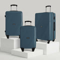 Hard-shell luggage set of 3, teal suitcases stacked with telescopic handles and 4 wheels
