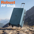 Hard-shell suitcase in teal with side zipper pocket and four spinner wheels