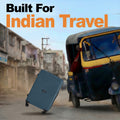 Hard-shell spinner suitcase in teal with telescopic handle and 4 wheels