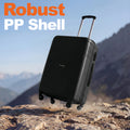Black hard-shell suitcase with side panel details, telescopic handle, and 4 wheels on ground.