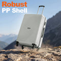 Large polypropylene suitcase, white, angled view with telescopic handle and four wheels.