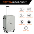 White medium 4-wheel suitcase with telescopic handle, shell texture, and test icons