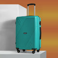Medium hard-shell suitcase with telescopic handle and four wheels, teal.