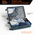 Teal large suitcase open interior with packing straps and zippered divider
