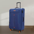 Blue soft-sided spinner trolley with telescopic handle, front zip pocket, and corner wheels
