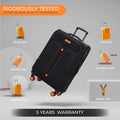 Black soft body spinner trolley angled view with top handle, zipper, and orange accents