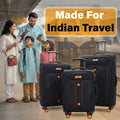 Three black soft body spinner trolleys with orange accents and telescopic handles