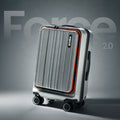 Gallardo hard-shell rolling suitcase, light silver with orange-trim edges and four wheels