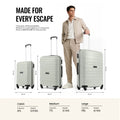 Set of light green hard-shell suitcases with telescopic handle and 4 spinner wheels