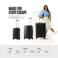 Set of three black check-in trolleys with retractable handles and eight-wheel bases