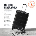 Black polypropylene trolley suitcase with telescopic handle and eight spinner wheels