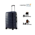 Navy medium trolley standing with telescopic handle and four visible spinner wheels