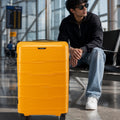 Yellow medium check-in trolley with telescopic handle and smooth eight wheels