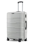 Large check-in trolley with telescopic handle, light grey polypropylene shell and wheels.
