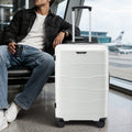 Polypropylene check-in trolley with light shell, upright handle and four wheels