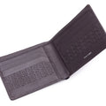 Brown bi-fold leather wallet open, embossed monogram on outer panel