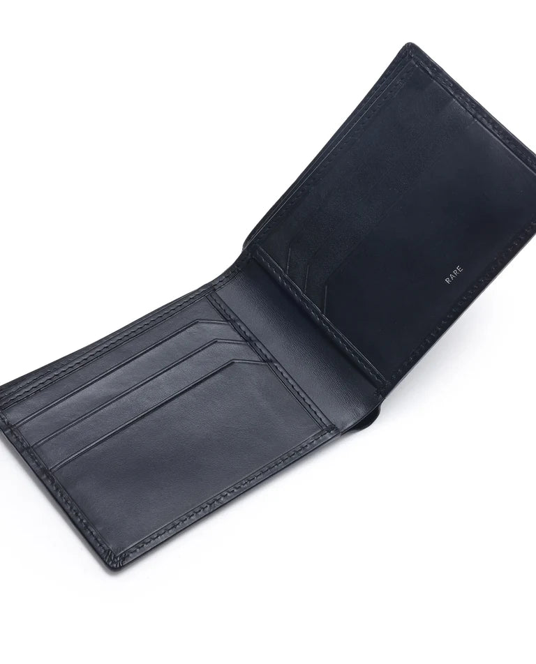 Black leather bi-fold wallet open, showing multiple card slots and interior panel.