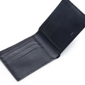 Black leather bi-fold wallet open, showing multiple card slots and interior panel.