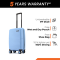 Blue small cabin suitcase with ribbed shell, front view, black telescopic handle