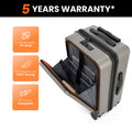Silver trolley suitcase with open laptop sleeve, orange trim, spinner wheels.