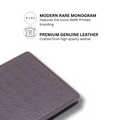 Dark brown leather bi-fold wallet with embossed Rare Rabbit monogram pattern