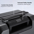 Hard-shell trolley luggage textured handle with padded bar and perforated grip panel.