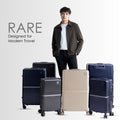 Hard-shell trolley luggage set with multiple sizes in dark blue, beige, and grey