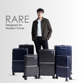 Hard-shell polycarbonate trolley suitcases with four sizes in dark blue, dark grey, and beige