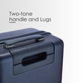 Hard-shell polycarbonate suitcase with two-tone handle and side grip
