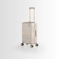 Hard-shell polycarbonate trolley suitcase with extendable handle and spinner wheels, beige
