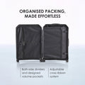 Hard-shell polycarbonate trolley suitcase open, showing two-panel divider pockets