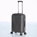Hard shell polycarbonate trolley luggage in dark grey with telescopic handle and spinner wheels