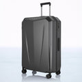 Hard-shell trolley luggage with dark finish, upright telescopic handle, and four spinner wheels