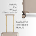 Beige hard-shell polycarbonate trolley with metallic rim wheels and telescopic handle