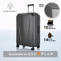 Hard-shell polycarbonate trolley luggage, matte dark grey, front view with side lock details