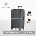 Dark grey hard-shell polycarbonate trolley suitcase, angled view with telescopic handle and wheels