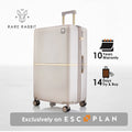 Beige hard-shell polycarbonate trolley suitcase with telescopic handle and spinner wheels