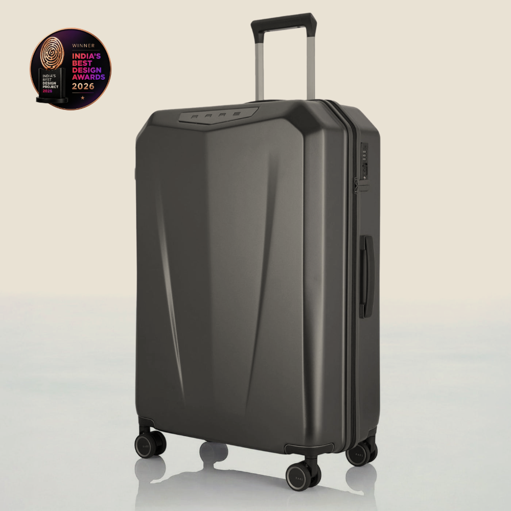 Hard-shell polycarbonate trolley suitcase, dark grey, side panel detail and wheels