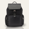 Black backpack with top handle, front zip pocket, and side zipper pulls