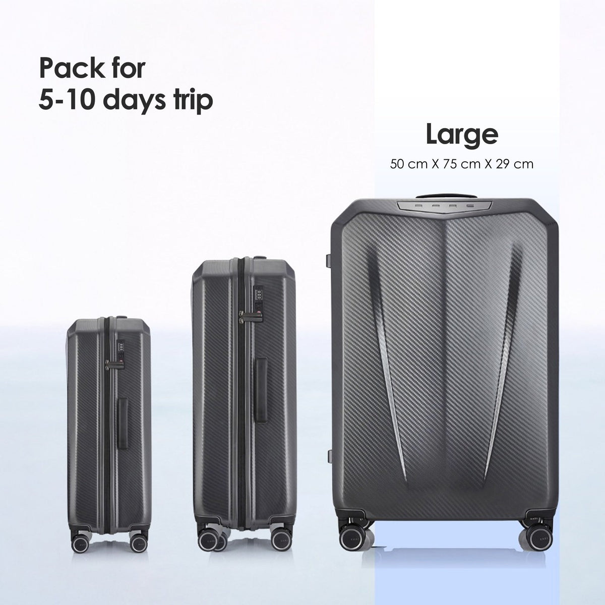 Large dark gray suitcase with four spinner wheels and recessed top carry handle